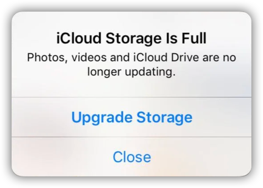 iOS alert showing iCloud Storage Is Full — photos, videos and iCloud Drive are no longer updating